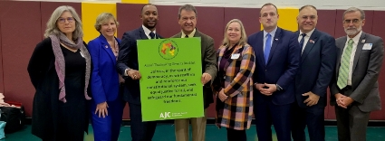 (L-R Leg. Erika Pierce, Board V. C. Nancy Barr, Majority Whip Tyrae Woodson-Samuels, C.E. George Latimer, Leg. Catherine Parker, Board Chair Vedat Gashi, Leg.-Elect Judah Holstein, Leg. Damon Maher)
