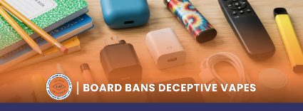 Everyday items on a table, including vape devices disguised as common objects beside chargers and school supplies.