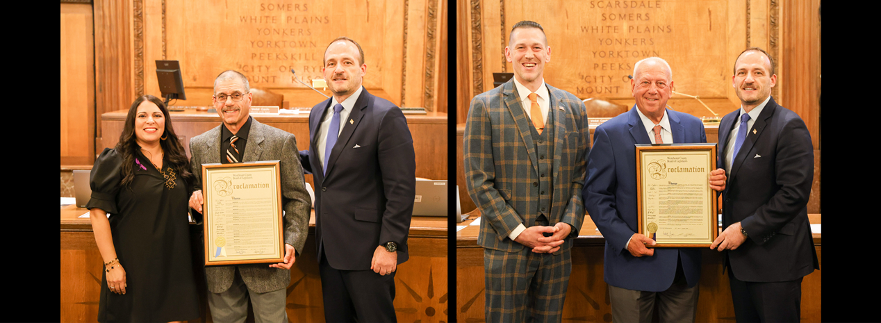 Legislators and honorees pose with framed proclamations during an Italian Heritage celebration in the legislative chamber.